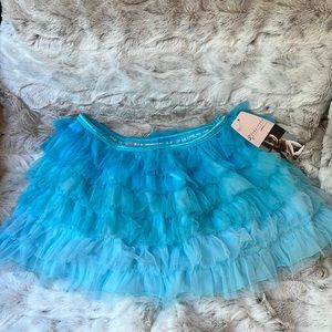 Danskin, Girls turquoise tutu skirt. Size L(10/12). NWT.